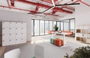 Espacio abierto con mesa Mobility blanca de Actiu con estructura y tablero elevables